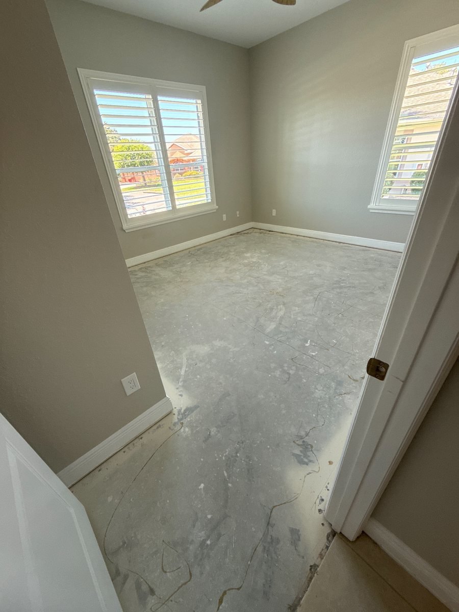 Bedroom before: bare concrete